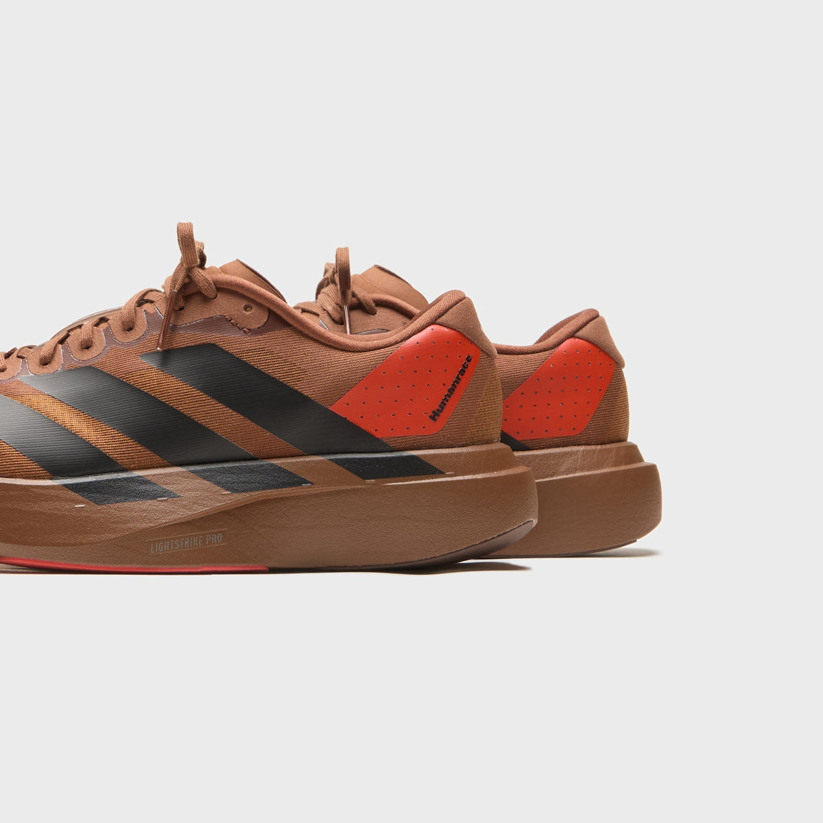 adidas x Pharrell Williams Adizero Evo SL - Brown / Craft Chili